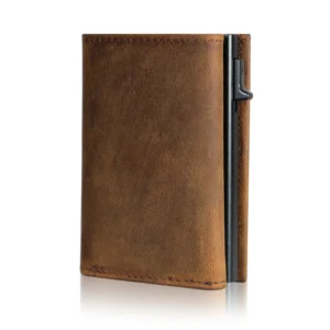 Front view of a vintage brown pop-up wallet showing raised cards, a side trigger and an external zip coin pocket