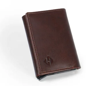 Dark brown leather pop-up wallet with staggered cards raised above the holder and a bottom release lever
