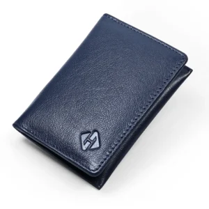 Navy blue leather bifold card holder standing closed, showing textured exterior and stitched edges