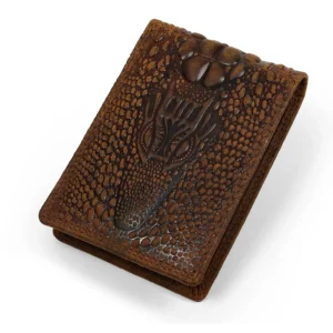 Closed brown leather bifold wallet with a raised crocodile-style pattern and stitched edges