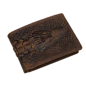 Dark brown wallet with a raised crocodile-head motif and antique-look scale pattern