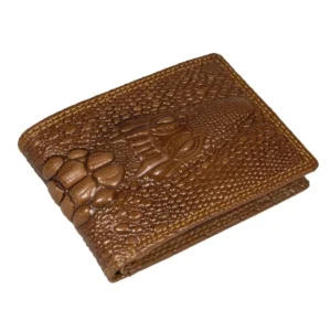 Brown bifold wallet with raised crocodile-head motif and embossed scale pattern
