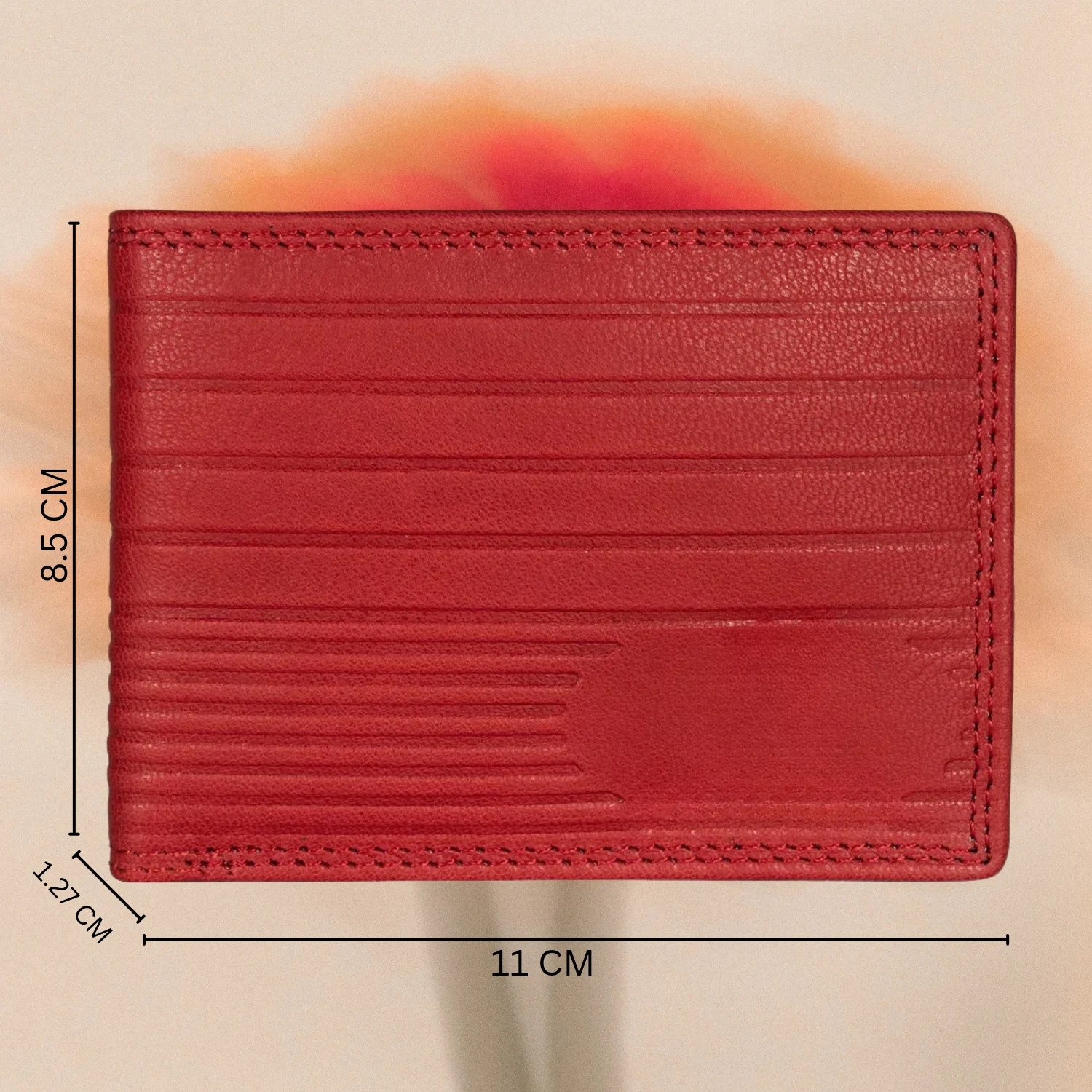 Red bifold wallet measuring 11 cm wide, 8.5 cm high and 1.27 cm thick